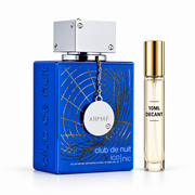 Armaf Club de Nuit Iconic bottle with Wear This Next 10ml travel size on a clean white studio background