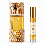 Lattafa Atheeri bottle with Wear This Next 10ml travel size on a clean white studio background