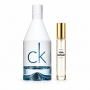 Calvin Klein CKIN2U Him bottle with Wear This Next 10ml travel size on a clean white studio background