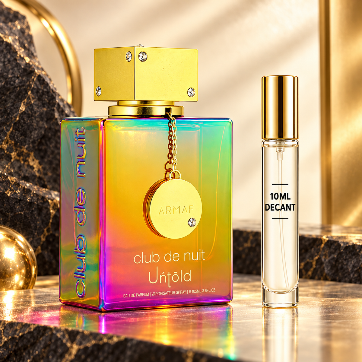 Armaf Club de Nuit Untold 105ml bottle beside a Wear This Next 10ml decant