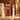 French Avenue Liquid Brun bottle beside a Wear This Next 10ml gold-lid decant